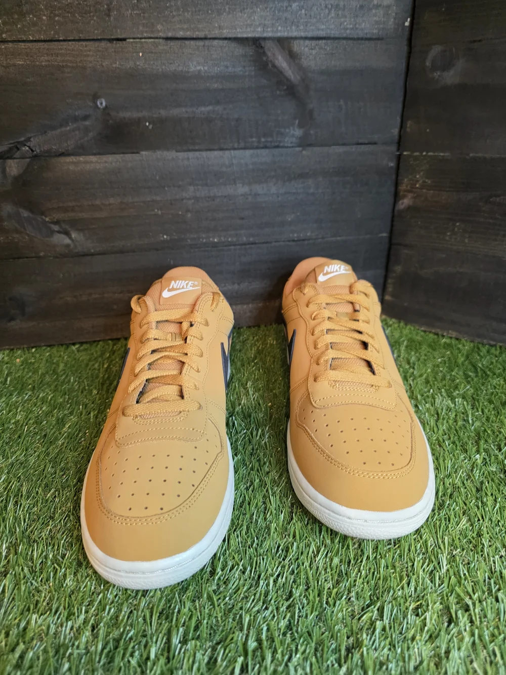 Nike Men's Low-Top Sneakers in Orange with Black Swoosh